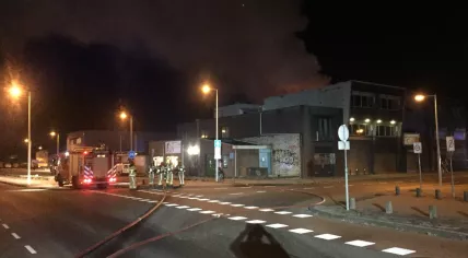 Firefighters at the scene of a fire on Slimmeweg in Amsterdam, 29 Nov 2016