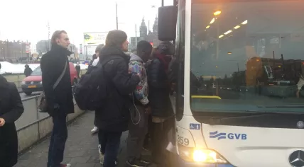 Passengers cram on a bus from Amsterdam Central to Sloterdijk, Amsterdam power outage 17 Jan 2017