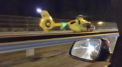Air ambulance lands at the scene of a hit-and-run accident involving 5 cars on the A16 near Zevenbergen, 5 Jan 2016