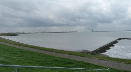 Westerschelde as seen from Bath with a Doel nuclear plant in the distance