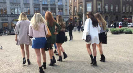 Women in Amsterdam celebrate the first official warm day of spring with short skirts, 30 Mar 2017
