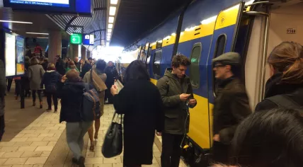 Passengers exiting a train at Amsterdam Sloterdijk station in 2017