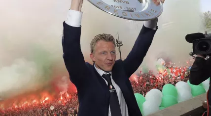 Feyenoord captain Dirk Kuijt lifts the Eredivisie trophy in front of some 150 thousand fans on the Coolsingel in Rotterdam, 15 May 2017