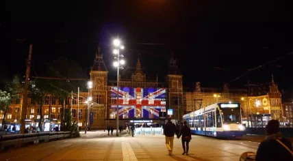 Amsterdam Centraal lit with the Union Jack to show solidarity with victims of the Manchester attack, 23 May 2017