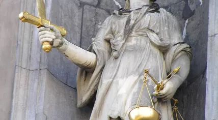 Lady Justice in Antwerp; one of few statues in which the lady is not blindfolded 