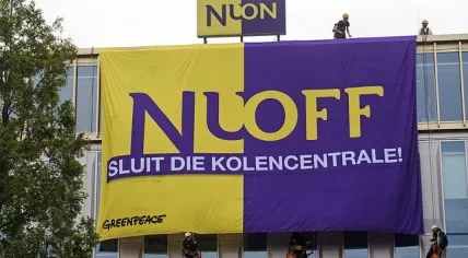 Greenpeace calls on Nuon to close its Hemweg coal plant in a protest at the energy company's Amsterdam headquarters, 20 Jul 2017