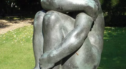A statue of a weeping woman at the Emaus cemetery in Vlaardingen 