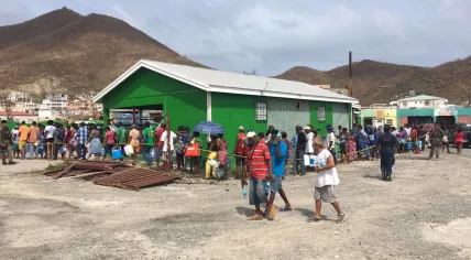 Sint Maarten residents stand in line for drinking water, 12 Sept 2017