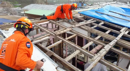 An USAR team builds a new roof for a Sint Maarten home damaged by hurricane Irma, 20 Sept 2017
