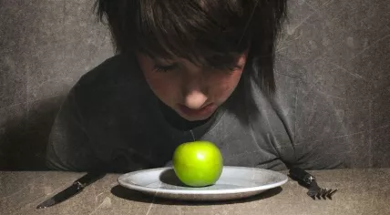 Child with apple