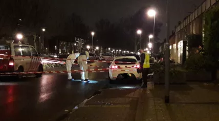 Forensic investigators at the scene of a double assassination on Rhijnauwensingel in Rotterdam, 20 Dec 2017