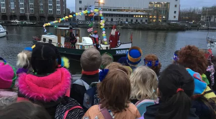 Kids jam the waterfront in Amsterdam Oost awaiting a visit from Sinterklaas and Piet before they return to Spain. 5 December 2017
