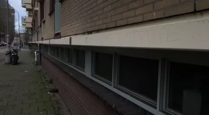 Fuck Justitie scrawled on the side of a building block where police responded to a shooting on Jan. 26. January 29, 2018