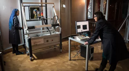 Scientists studying Johannes Vermeer's 'Girl wit a Pearl Earring' in the Mauritshuis museum, Feb 2018