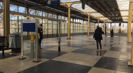 People smoking on a platform at Amsterdam Amstel Station, 8 Feb 2018