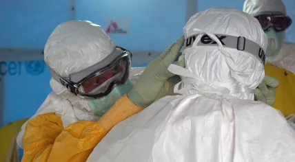 Doctors Without Borders staff preparing to enter an Ebola treatment unit in Liberia, August 2014