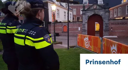 Police officers waiting for the Royal Family's arrival on Prinsenhof in Groningen, King's Day 27 April 2018