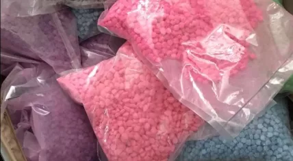 Ecstasy pills confiscate in a dark web drug bust in Brunssum, 16 May 2018