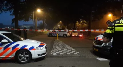 Police at the scene of a fatal shooting on Hoogheuvelstraat in Oss, 4 June 2018