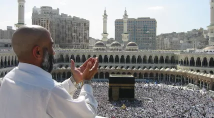 Supplicating Pilgrim at Masjid Al Haram. Mecca, Saudi Arabia.
