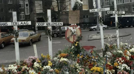 Crosses placed on Museumplein in Amsterdam for Hans ter Laag, Koos Koster, Jan Kuiper and Joop Willemsen - four Dutch journalists killed in El Salvador in 1982, 22 March 1982