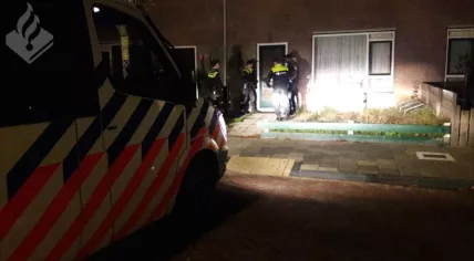 Police enter the home of a suspect of vandalism and arson in Noordwijk, 29 Oct 2018