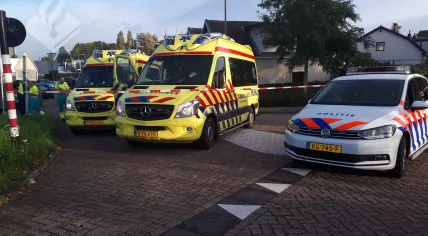 Police and ambulances at the scene of a collision between a truck and a cargo bike on Stationsweg in Bodegraven, 12 Oct 2018