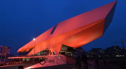 EYE film museum in Amsterdam illuminated in orange to protest violence against women and girls, 25 November 2018
