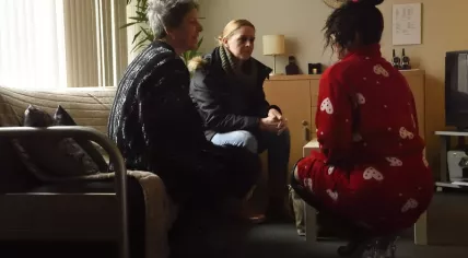 Police speaking with a prostitute during an undercover operation in Breda, 15 December 2018