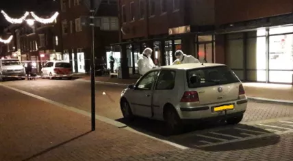 Forensic investigators at the scene of a shooting on Molenstraat in Helmond, 21 Jan 2019