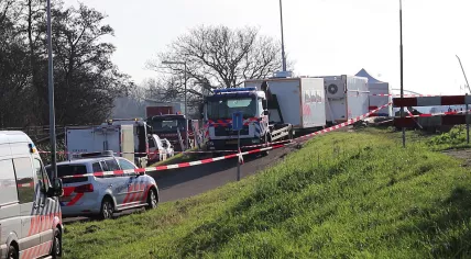 Police at the Zuider IJdijk in Amsterdam where a woman's torso was found in a suitcase, 19 Jan 2019