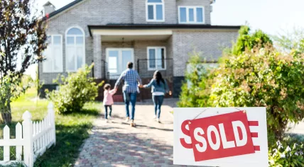 Sold sign in front of a home