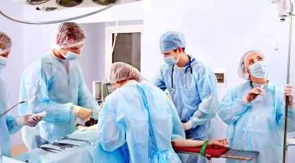 Doctors and nurses in an operating room