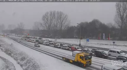 Traffic in Arnhem from Snow