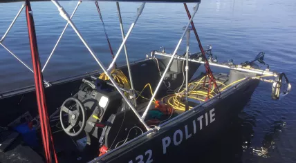 Police searching the Zuider IJdijk after a body was found there in a suitcase on 19 Jan 2019