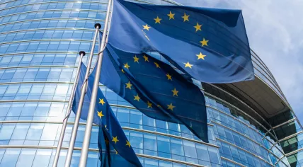 EU flags in front of the European Commission 