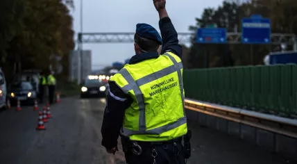 Koninklijke Marechausee officer performing a traffic check