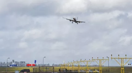 Airplane arriving at Schiphol Airport