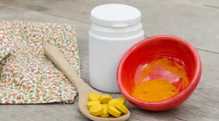 Turmeric tablets and powdered spice