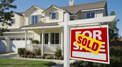 Sold sign in front of a home