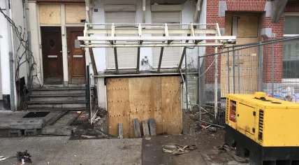 The exterior of the Smoke Palace and the connected flats showed signs of extensive damage after an explosive was detonated in front of the building. Linnaeusstraat, 4 March 2019