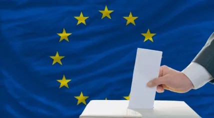Ballot box and EU flag