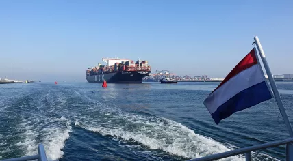 Container ship at the port of Rotterdam