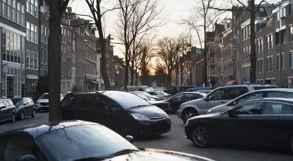 Cars and vans parked in Amsterdam