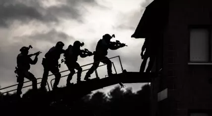 The Dutch police's special intervention service entering a home