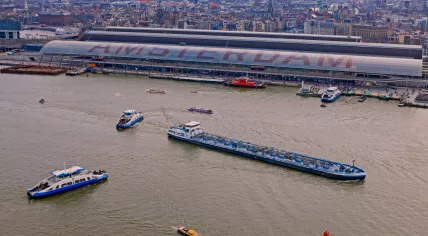 Shipping traffic on the IJ at Amsterdam Centraal