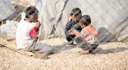 Children playing in a refugee camp