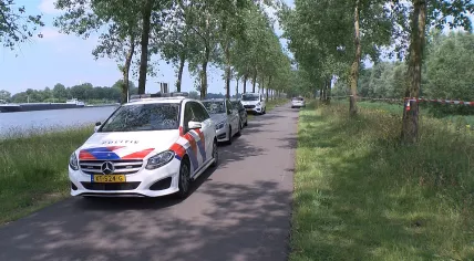 Police at a meadow on Sint Anthoniekade in Westdorpe, where a woman's naked body was found on 22 June 2019