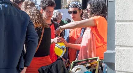 Woman selling laughing gas in Amsterdam