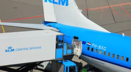 KLM Catering Services delivering meals to a KLM plane